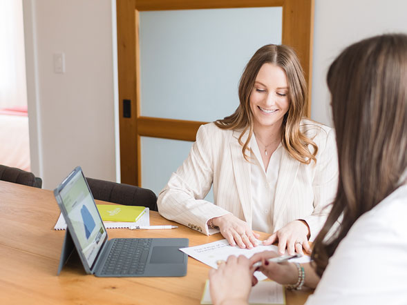 two people working together